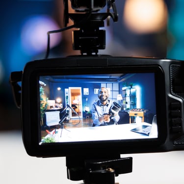 a video camera and a video camera on a tripod