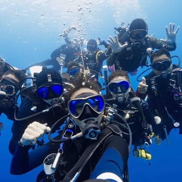 underwater group photo of divers