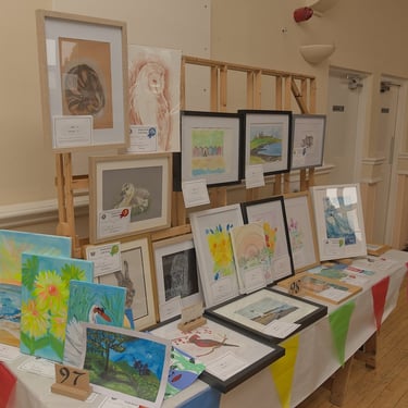 Some of the paintings exhibited at The Sandy Garden & Craft Show