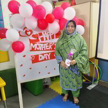 "Rich chocolate tart with a glossy ganache topping, elegantly presented on a white plate."