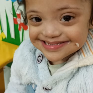 Child interacting with sensory toys during therapy