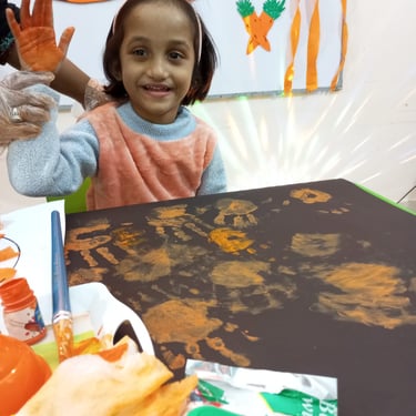 Child focused on creative sensory therapy activity