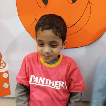 Child focused on creative sensory therapy activity