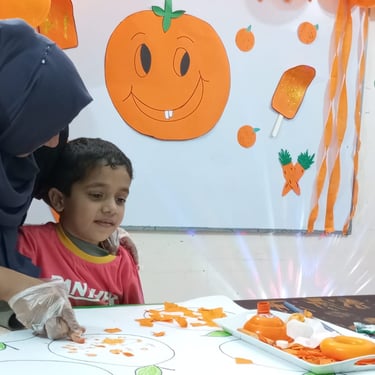 Child focused on creative sensory therapy activity
