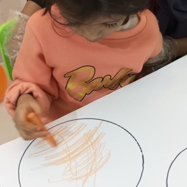Child enjoying a hands-on sensory therapy experience
