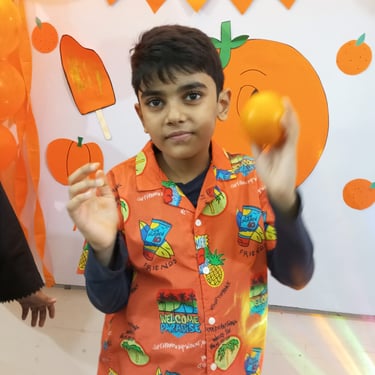 Child engaged in sensory exploration with materials