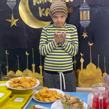 "Slice of decadent cake with layers of cream and fruit, presented on a decorative plate."