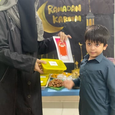 "Beautifully arranged table with a variety of dishes, including a cake, fruit, and drinks, set for a celebration."