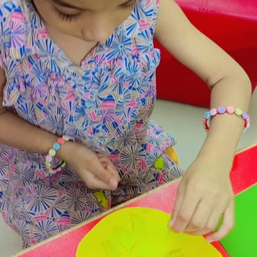 Child engaged in imaginative play during therapy