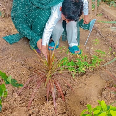 Child interacting with a therapist during play