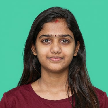 A happy child wearing a bright, neatly tailored Wonder Wings school uniform, smiling outdoors.