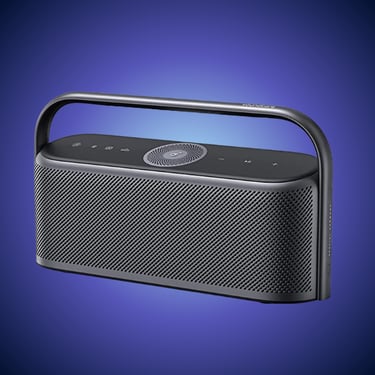 Soundcore Bluetooth wireless earbuds and portable speaker in sleek black design.