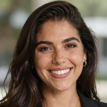 Happy person holding a smartphone displaying a colorful digital invitation on screen.