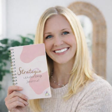 Woman holding journal