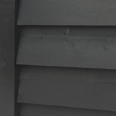 bardage bois brûlé façade sur facade de maison