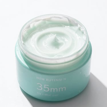 clean product shot of a hydrating hair mask jar, bright high-key natural light, clean white background, sharp focus, 35mm