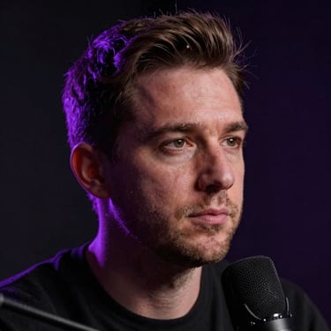 High-contrast close-up portrait of a thoughtful man in a dark podcast studio, illuminated by sharp purple rim light, moody low-key photography