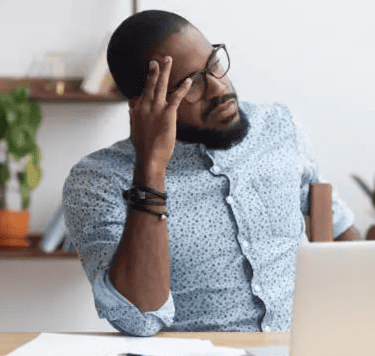 Spanish student learning spanish online in his office at home
