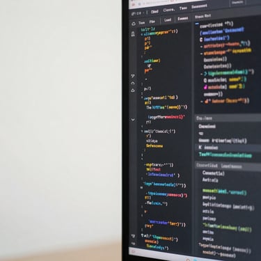 Macro close-up of a high-resolution code editor displaying clean structural syntax alongside a muted analytics dashboard, soft diffused daylight, architectural crop.