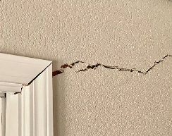 drywall crack doorway corner
