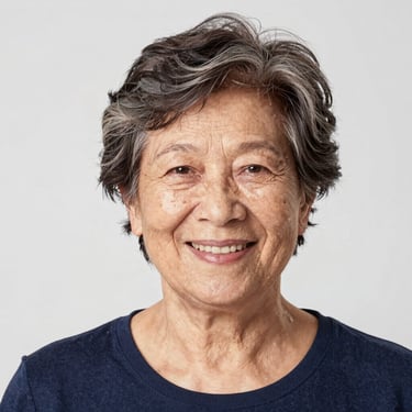 Portrait of a friendly middle-aged person smiling, representing a satisfied community member.