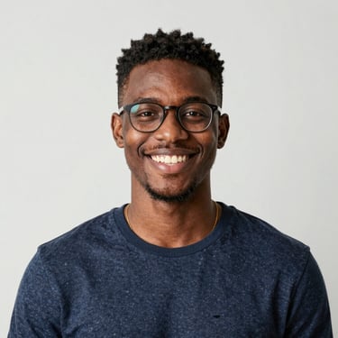 A smiling elderly woman holding hands with a gentle caregiver in a cozy living room.