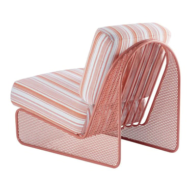 Outdoor lounge chairs with striped cushions, soft performance fabric and warm patio styling for comf