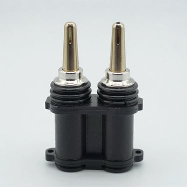 Crisp studio shot of an ignition coil pack, bright lighting, light gray background