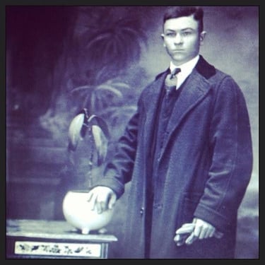 black and white photo of a young Italian man posing for a picture