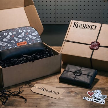 Kooksey product packaging. Black tissue paper, twine, wax seal, Kraft tag, boxes and custom sticker