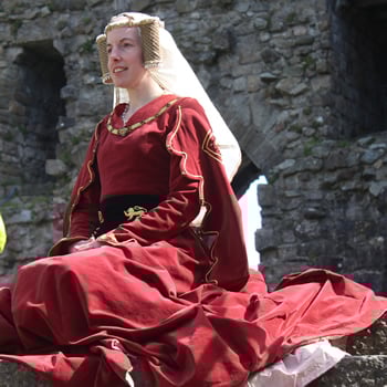 Isabella daughter of Edward III sits watching a tournament