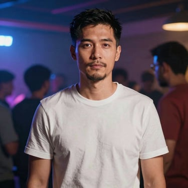 Photo of a happy customer holding paint cans inside a bright store with orange and navy blue accents.