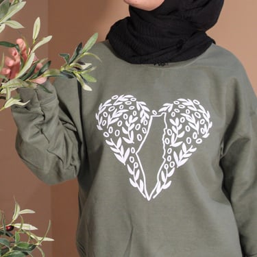 model wearing green sweatshirt 