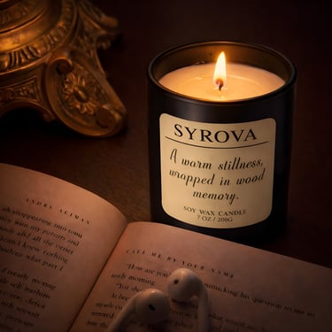 Minimalist home decor styled with luxury soy candle and warm lighting