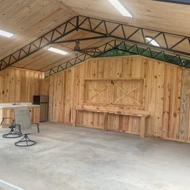Rough cut lumber walls and shiplap ceiling