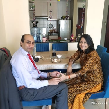 Dr. Prabal Frank Nandwani in a formal clinical consultation with a patient in Dubai, UAE.