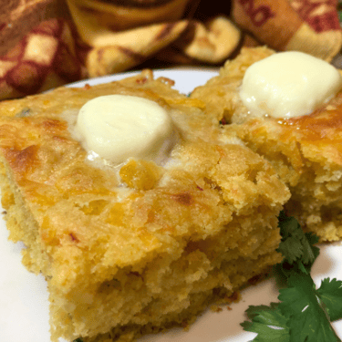 mexican cornbread topped with large pats of butter