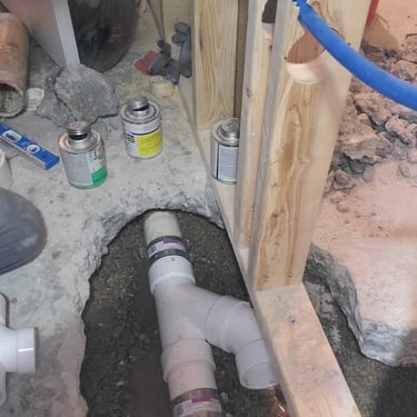 rough installation of plumbing pipes during a bathroom remodeling project