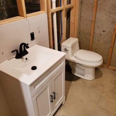 new sink fixture and toilet for bathroom remodel