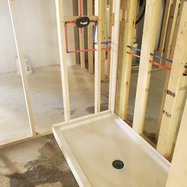 water lines for new shower during bathroom remodeling project