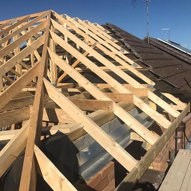 A total roof replacement including rafters, joists and beamsoists 