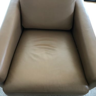 dirty dark brown armchair