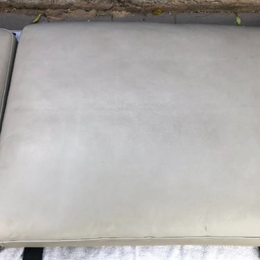 dirty beige leather seat cushion