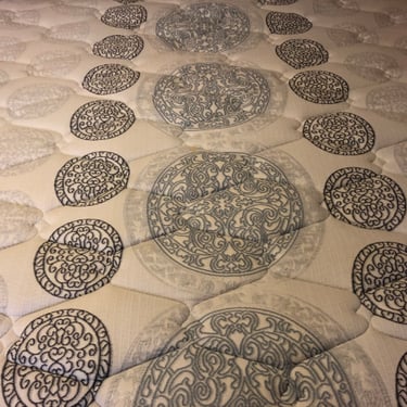 Previously stained queen-size mattress with body oil, now cleaned after professional mattress cleaning