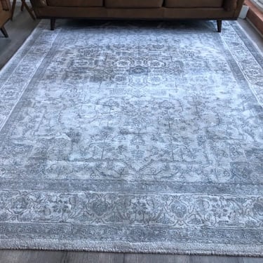 cleaned large grey rug with patterns