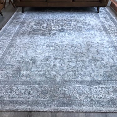 large grey rug with patterns