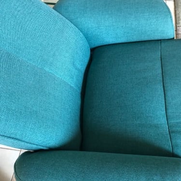 previously heavily soiled blue recliner now cleaned after sofa cleaning service