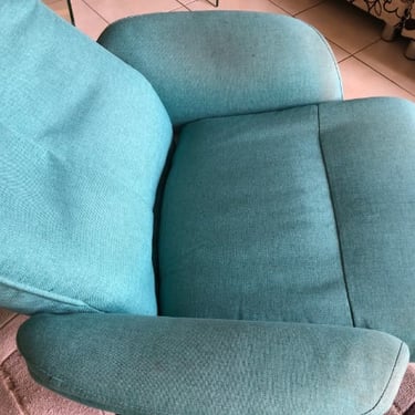 heavily soiled blue recliner