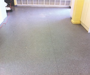 dull kindergarten vinyl floor before restoration