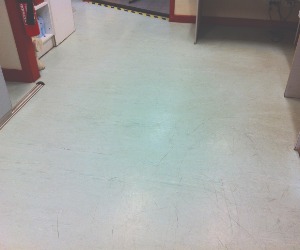 dull grey vinyl floor in stirling before professional strip and seal